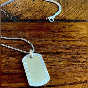 14 carat white gold dog tag necklace with VVS1 diamonds